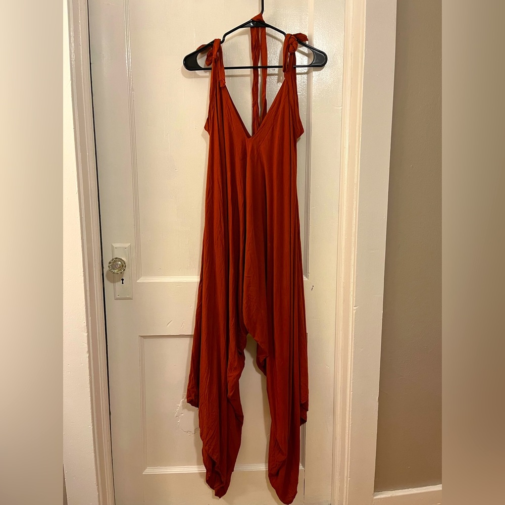 NWOT orange flowy jumpsuit